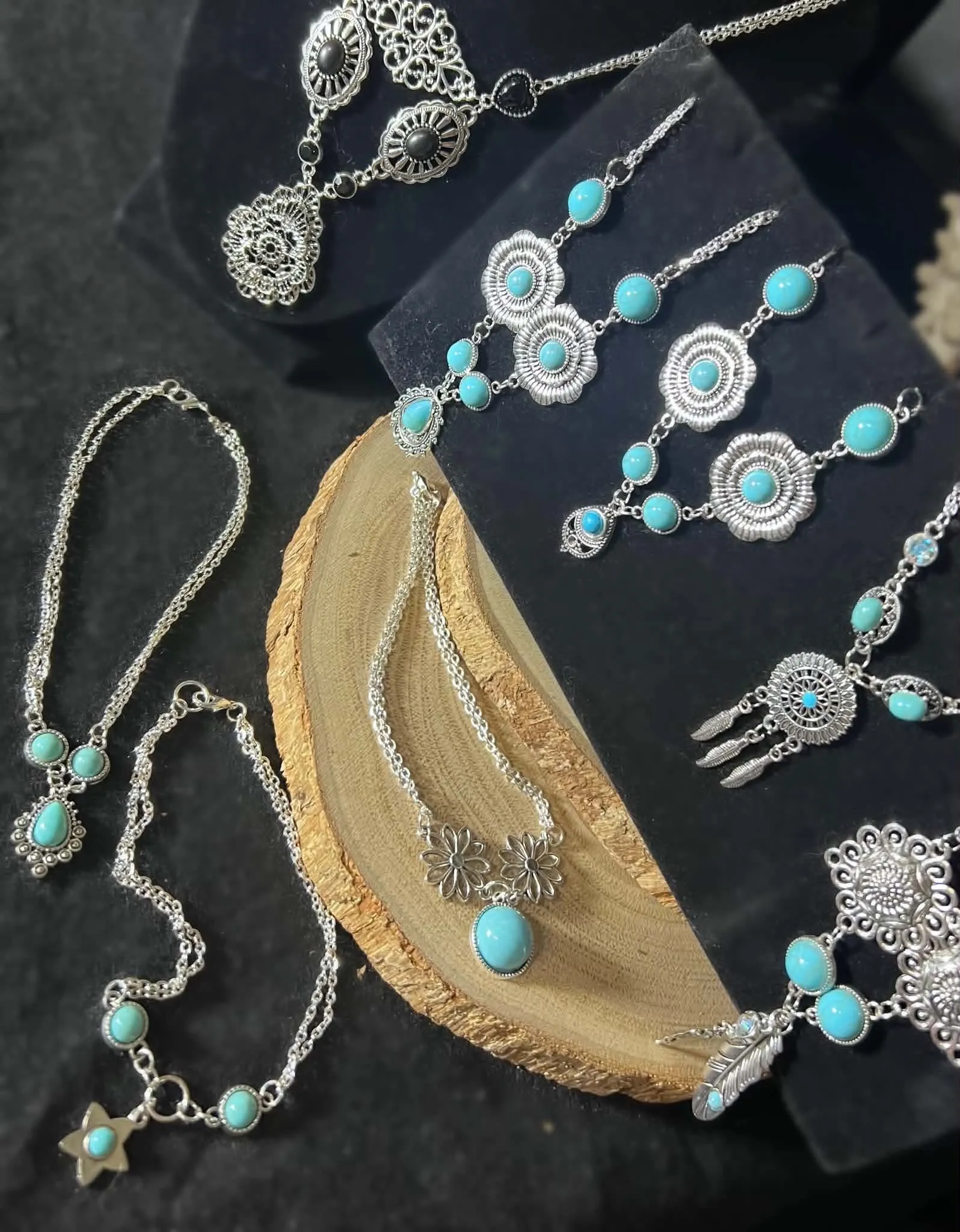 Assorted handcrafted western jewelry laid out together