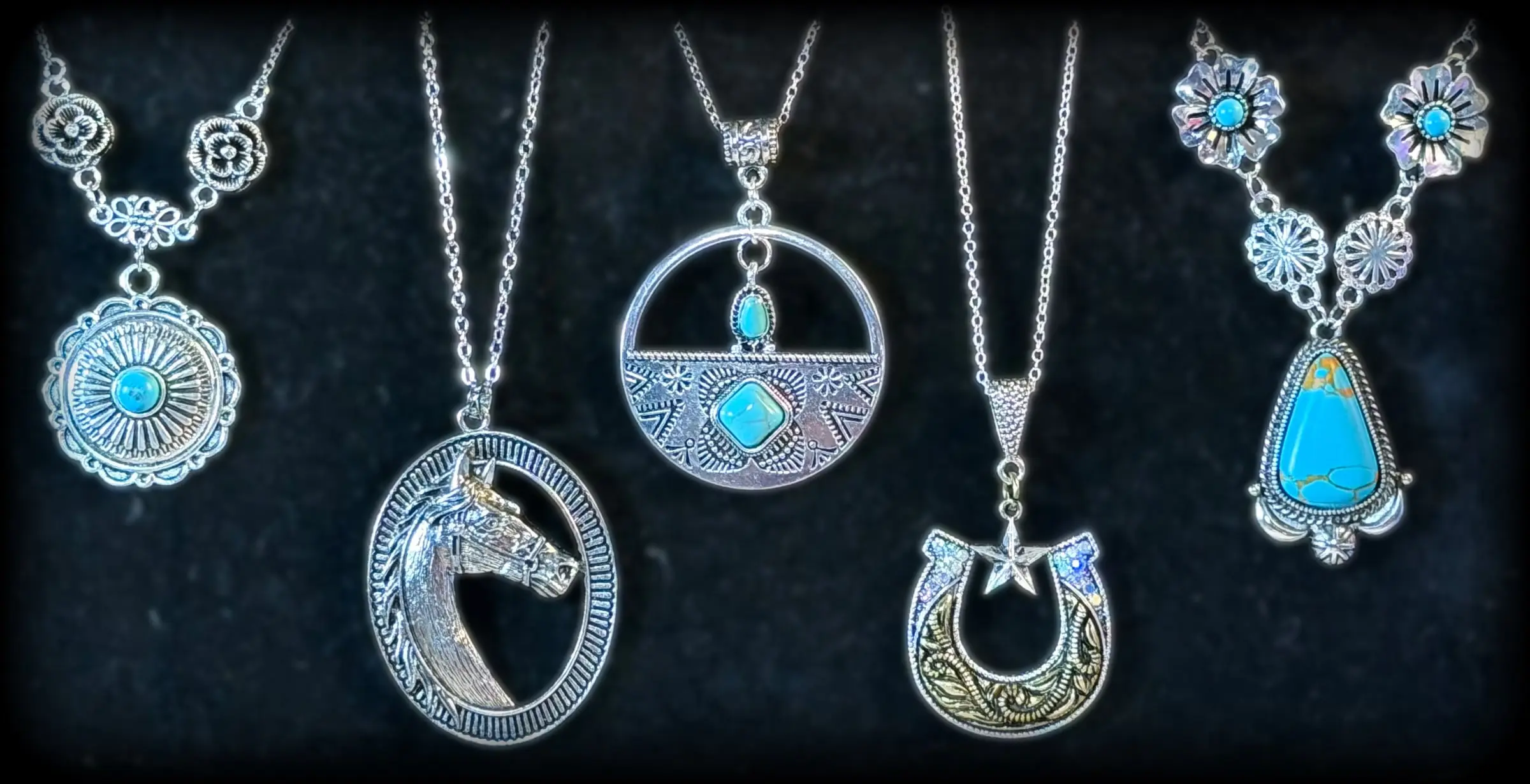 Five western pendants: a rose concho, a horse head oval, a turquoise circle medallion, a star horseshoe and a turquoise teardrop on blossoms